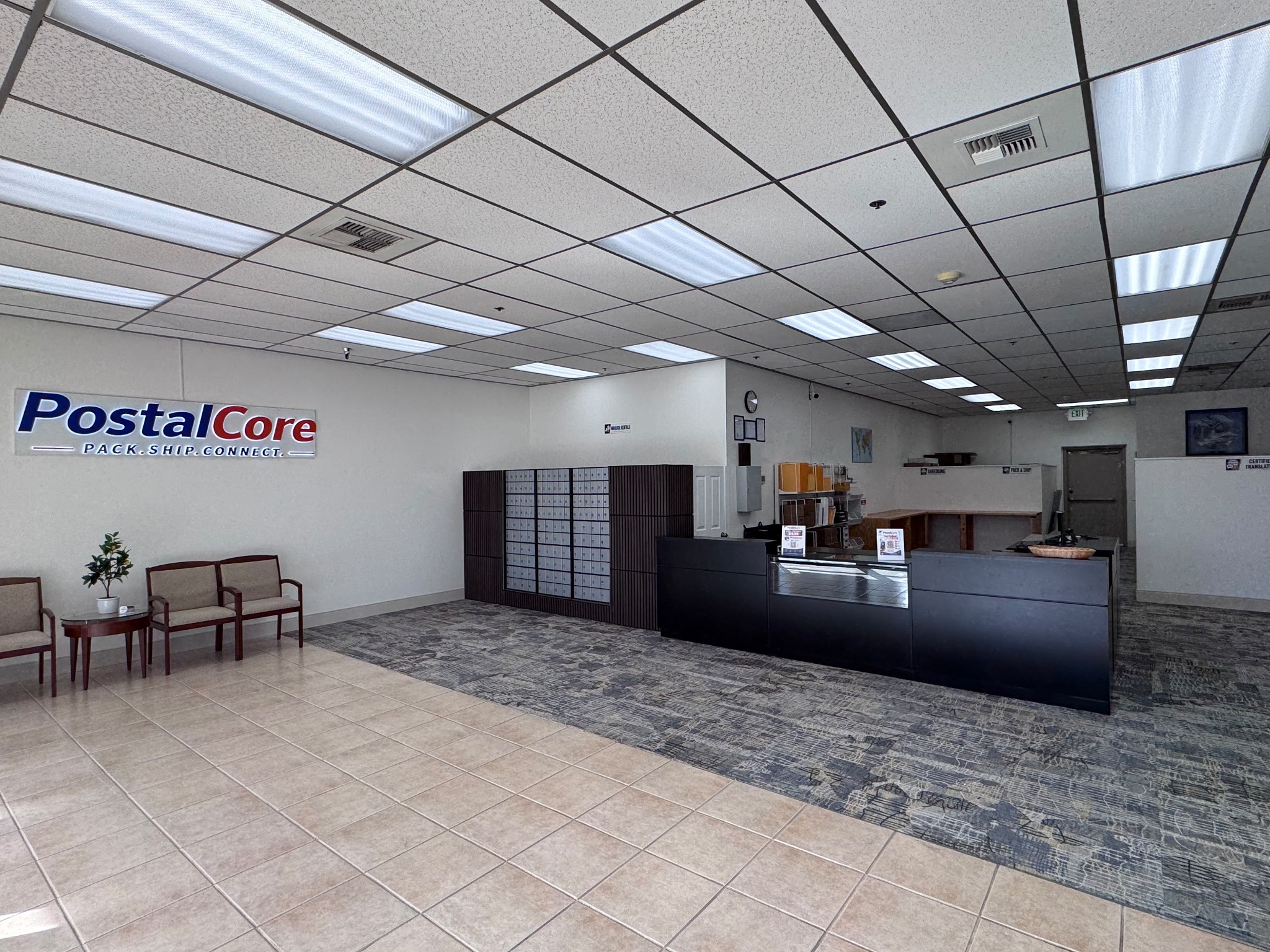 PostalCore interior in Kent Washington with private mailboxes and shipping counter